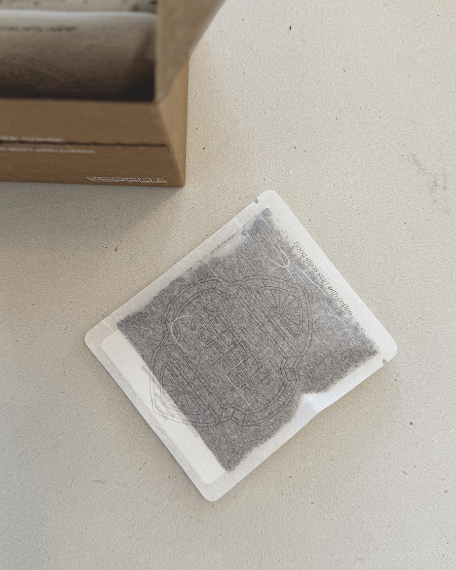 Square gray pouch on a white background