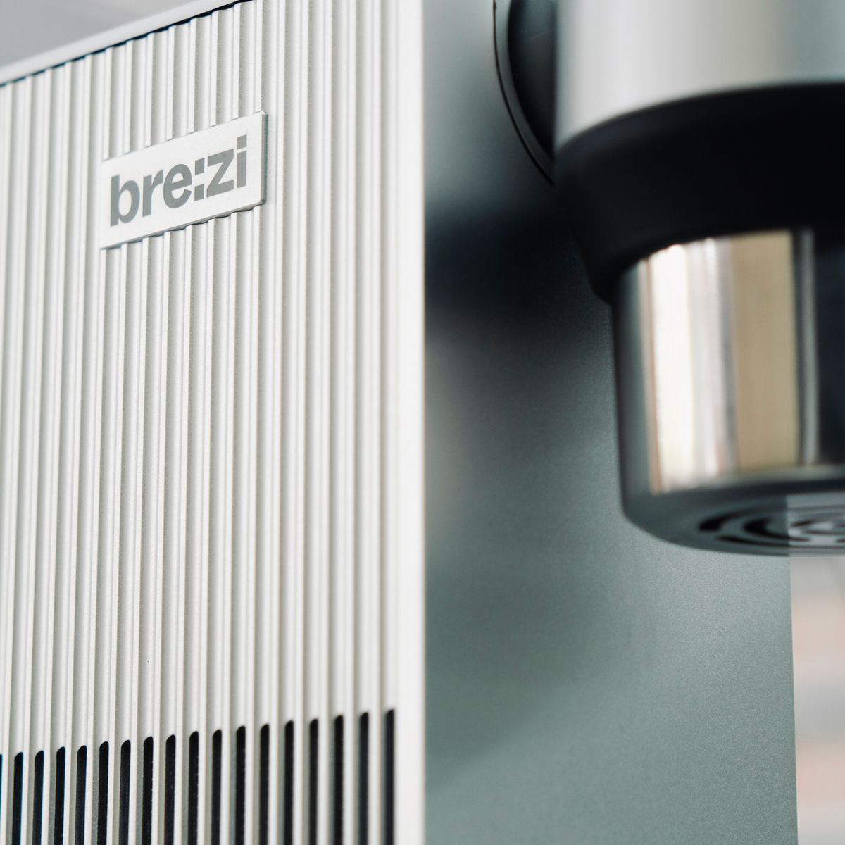 Close-up of a breizi coffee machine with a focus on the brand name.