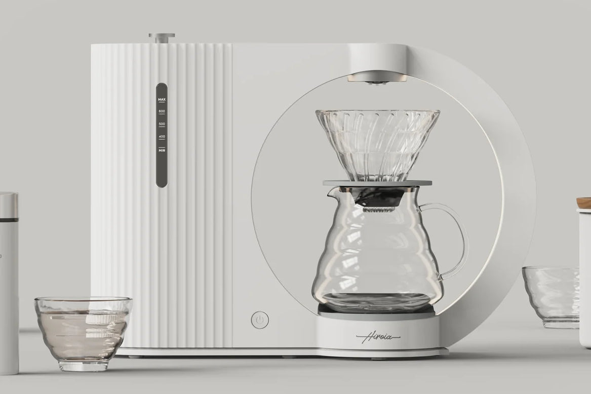 Front lifestyle photograph of the Hikaru V60 smart coffee brewer system w/glass kraft