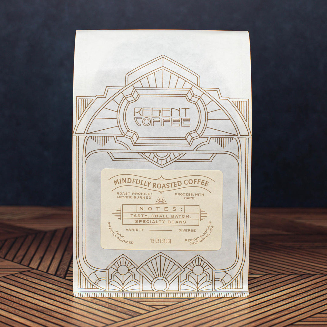 Barrel Aged Burundi coffee beans in 12oz compostable bag from Regent Coffee.